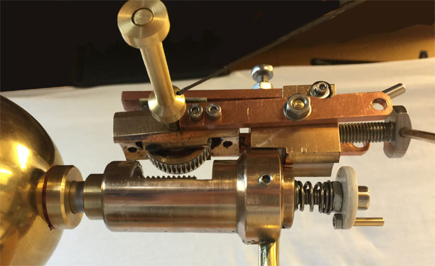 A close-up photo of the worm drive gear box mounted on Hero engine version 4-front view
                        
